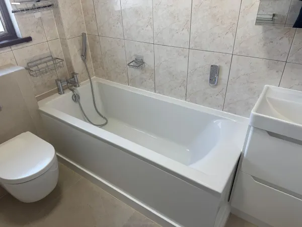 Finished family bathroom with bath, basin and toilet